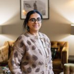 Professional headshot of Noreen, mindset coach helping women overcome limiting beliefs