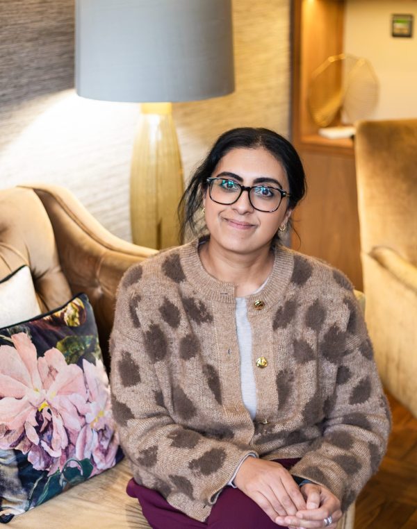 Professional headshot of Noreen, helping women create a calmer life